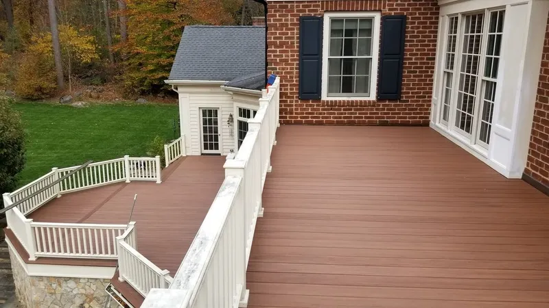 A second-story view of a deck restored by Artisanal Restoration